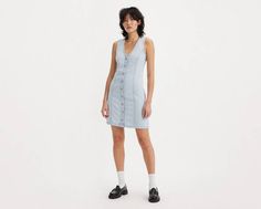 Cut with a flattering A-line silhouette, our Thora Denim Mini Dress features a v-neckline, a button-up front and a figure-hugging mini cut. An ultra-flattering denim mini dress Cut with a figure-hugging, A-line fit With a button-up front Features western yoke detailing on the back Levi's Casual Denim Dress For Summer, Levi's Casual Dresses For Spring, Levi's Casual Summer Dresses, Casual Levi's Dresses For Spring, Levi's Cotton Denim Dress For Summer, Levi's Casual Summer Denim Dress, Casual Fitted Levi's Dress, Levi's Casual Spring Dresses, Levi's Casual Denim Summer Dress