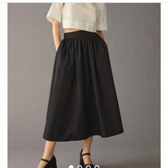 Mare Mare X Anthropologie A-Line Skirt Black Lined Relaxed Skirt Bottoms, Casual High Waist Black Maxi Skirt, Black Long Skirt For Spring, Casual Black Lined Maxi Skirt, Black Midi Length Gathered Skirt, Black Flared Skirt For Summer, Relaxed High Waist Black Skirt, Black High Waist Relaxed Skirt, Casual Black Flared Skirt Bottoms