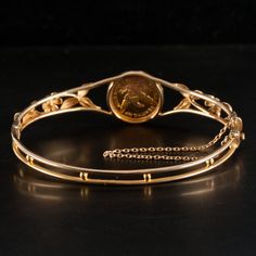 Vintage 1950's 14k Yellow Gold 1853 Liberty Head 5$ Coin Hinged Bangle BraceletMetal Information: 14k Yellow Gold / Coin Is 90% GoldTotal Weight: 18.4gBracelet Width: 18.8mmBracelet Length: 7.5"Circa: 1950'sEstimated Retail Price: $3475.00OUR PRICE: $2780.0044654 Antique Yellow Gold Bracelet For Evening Wear, Antique Yellow Gold Bracelets For Evening, Vintage Cuff Bracelet With 17 Jewels For Formal Occasions, Vintage Formal Bangle With Jubilee Bracelet, Yellow Gold Estate Jewelry, Vintage 14k Gold Hallmarked Bangle, Vintage 14k Stamped Gold Bangle Bracelet, Gold Estate Jewelry Stamped 14k, Vintage 14k Gold Bangle