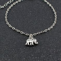 New Elephant Ankle Bracelet ~Choose from Stainless steel anklet chain or Silver plated anklet chain ~Anklet measures available in 9 inch, 10 inch, or 11 inch length plus has a 1 inch extender ~Elephant charm measures 1/2 inch wide ☆ Ships within 24 hours of purchase Monday-Saturday Adjustable Alloy Anklets For Gift, Adjustable Alloy Anklet As Gift, Silver Alloy Anklet As Gift, Adjustable Metal Dangle Anklets, Adjustable Alloy Summer Anklets, Summer Adjustable Alloy Anklets, Silver Casual Anklets For Festival, Casual Silver Anklets For Festival, Adjustable Metal Anklets Nickel Free