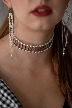 The choker is made of 2 rows of natural freshwater pearls and metal fittings in the form of sticks. The silver-colored fittings are made of jewelry stainless steel and brass. The choker will be a great gift for your girlfriend, wife, sister and yourself. Buy it for birthday, anniversary, graduation and wedding. JUST ONE SUCH NECKLACE QUALITY The high-quality materials I use in my jewelry are truly exceptional. They are carefully selected by me and come from trusted suppliers with whom I have a good relationship. Their timeless beauty and elegance make them an essential component of any jewelry collection. Whether it's a classic pearl necklace or a contemporary design, my high-quality pearls add sophistication and luxury to any outfit. View my entire shop here: https://www.etsy.com/shop/Tor White Metal Pearl Choker Necklace, Silver Pearl Bracelet With Pearl Charm For Party, Sterling Silver Pearl Chain Necklace For Party, Silver Pearl Chain Choker, Elegant Silver Choker With Pearl Drop, Elegant Silver Choker With Pearl Pendant, Silver Pearl Drop Bracelet For Party, Modern Silver Pearl Chain Necklace, Metal Pearl Charm Choker Necklace