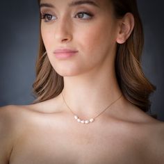 "New but classic Pearl Necklace with freshwater pearls in 14k Gold Fill chain. A Simple, Dainty Chain necklace offers a minimal take on the pearl trend and also looks great layered with other pieces. - Set with freshwater cultured pearls. Made in 14k gold-fill, the alloy that gives our pieces its beautiful, subtle hue. - chain sizes 12\" to 22 inches. - Pearl size: 3.5 - 4.5 mm. ♥ We use cultured pearls from oysters and freshwater mussels that we carefully select for our pieces. Pearls are sensi Yellow Gold Single Strand Pearl Necklace For Wedding, Yellow Gold Single Strand Necklace For Wedding, Delicate Single Strand Necklace For Anniversary, Delicate Pearl White Necklace For Anniversary, Pearl Briolette Jewelry For Anniversary, Pearl Necklace With Briolette Cut For Anniversary, Wedding Briolette Pearl Pendant Jewelry, Graceful White Necklace For Anniversary, Minimalist Single Strand Pearl Necklace For Anniversary