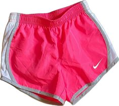 Pink Sports Shorts For Spring, Pink Sporty Athletic Shorts For Running, Sporty Pink Athletic Shorts For Running, Pink Gym Shorts For Spring, Spring Pink Shorts For Gym, Pink Sportswear Athletic Shorts For Gym, Nike Pink Athletic Shorts For Summer, Casual Pink Running Shorts, Pink Nike Athletic Shorts For Spring