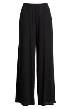 Whisper light and stretchy, these finely ribbed pants with a flowy, wide-leg silhouette are a dreamy soft addition to your bedtime routine. 30" inseam; 26" leg opening; 13" front rise; 13" back rise (size medium) Elastic waist 59% polyester, 32% viscose, 9% spandex Machine wash, tumble dry Imported Black Dance Pants, Full Length Rayon Pants For Loungewear, Wide Leg Rayon Lounge Pants, Chic Comfort Stretch Pants For Loungewear, Casual Wide Leg Modal Bottoms, Casual Modal Wide Leg Bottoms, Chic Modal Bottoms For Loungewear, Solid Straight Leg Harem Pants For Loungewear, Stretch Wide Leg Harem Pants For Relaxation