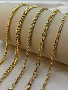 18k Gold Rope bracelet, 7.5 inches ,3.44 gr ,3.30mm 18k Gold Figaro bracelet, 8" inches ,1.5mm 14k Gold Franco bracelet, 7.5 inches ,4.22 gr ,3.20mm 14k Gold Curb Chain bracelet, 7.5 inches ,6.47 gr , 5mm 14k Gold Cable Chain bracelet, 7.5  inches ,4.65 gr , 5mm Please let me know if you want to customize the size . Premium lobster clasp Hook for added safety! Priced to sell! Compare our prices to other similar sellers! Arrives in a GIFT BOX and includes FREE SHIPPING within the USA and Canada. Luxury Gold Bracelet With Figaro Chain As Gift, Luxury 14k Gold Bracelet With Figaro Chain, Gold Plated Figaro Chain Bracelet Gift, Yellow Gold Bracelet With Figaro Chain, Luxury Men's Gold Bracelet With Gold Chain, Real Gold Bracelet, Real Gold Chains, Packing Jewelry, Gold Chains For Men