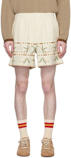 Wide-leg hopsack linen- and cotton-blend shorts. Graphic cross-stitching pattern throughout. · Concealed drawstring at elasticized waistband · Three-pocket styling · Zip-fly · Logo embroidered at back pocket Supplier color: Ecru/Multi Fly Logo, Linen Men, Embroidered Shorts, Mens Bottom, Shorts With Pockets, Logo Embroidered, Short Outfits, Casual Shorts, Cotton Blend