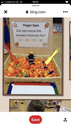 a box filled with legos next to a sign that says finger gym can you rescue the numbers from the fire?