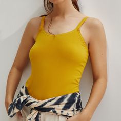 Anthropologie Seamless Layering Cami, Gold In Color, New With Tags, Sizes M And L. Polyamide And Elastane 20” L Machine Wash Summer Stretch Seamless Camisole, Yellow Stretch Camisole With Spaghetti Straps, Stretch Summer Camisole, Casual Solid Camisole With Seamless Construction, Casual Solid Seamless Camisole, Seamless Casual Camisole, Spring Solid Camisole With Bra Friendly Design, Spring Solid Camisole With Bra-friendly Design, Solid Bra-friendly Camisole For Spring