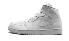 The Air Jordan 1 Mid “Triple White” removes any trace of color for an ultra wearable rendition of Michael Jordan’s first signature shoe. Lowered down to mid-top form, this Jordan 1 “Triple White” features soft white leather across the entire upper. Tonal details like the Swoosh on each side and a classic Wings logo on the collar add subtle styling. Additional design elements include a white nylon tongue tab with Jumpman branding and a perforated toe that allows for constant airflow to the foot. Jordan 1 Mid Triple White, Mid Sneakers, Wings Logo, Swoosh Logo, Mid Top, Air Jordan 1 Mid, Jordan 1 Mid, Black & White, Nike Dunk