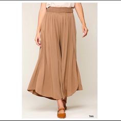 ~ 100% Rayon ~ Tan ~ Side Slits ~ Palazzo Pants Bin: K Trendy Rayon Bottoms For Spring, Chic Full-length Culottes With Elastic Waistband, Trendy Rayon Bottoms With Elastic Waistband, Trendy Spring Wide Leg Rayon Pants, Chic High-waisted Wide Leg Pants With Side Slits, Brown Wide Leg Bottoms For Spring, Trendy Wide-leg Bottoms, Trendy Rayon Bottoms For Day Out, Rayon Trousers For Day Out