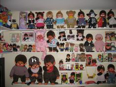 there are many different dolls on the shelves