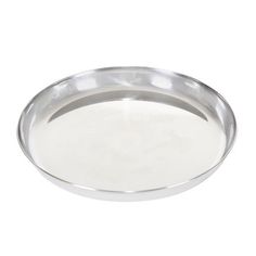 a round metal tray on a white background