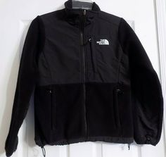 Women's black The North Face jacket in size XL.  It is part fleece and is fleece lined.  Around the bottom can be adjusted with an elastic "tie".  Excellent condition.  Has 3 pockets that have zipper closure.  Fully zips up the front.   19" from armpit to armpit 23" from the top of the shoulder to the bottom NBEBVEE-8 The North Face Fleece Jacket With Pockets For Streetwear, The North Face Long Sleeve Fleece Jacket For Streetwear, Black The North Face Fleece Jacket With Fleece Lining, The North Face Jacket, North Face Jacket, Fleece Jacket, North Face, The North Face, Zip Ups