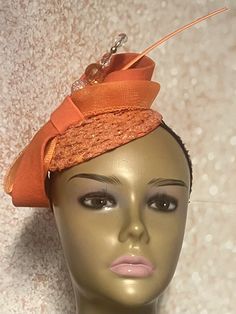 Orange Sequins Felt Half Hat for Church, Wedding, Mother of the Bride, Bridesmaids gift, Head Covering, Tea Parties Hat is trimmed with felt and crinoline bows, hat pin and feather stem. Perfect for any special occasion. The hat pin may vary and is for decorative purposes only. Measurement  5.3 inches circumference (base) Hat can be worn on either side of the head. Gifts for mom, sister, wife, or yourself. Covered Hats by Christian Design Studios Handmade Formal Hats, Elegant Hats With Matching Headband For Kentucky Derby, Elegant Adjustable Fascinator With Matching Headband, Fitted Mini Hats With Matching Headband For Kentucky Derby, Elegant Party Fascinator With Matching Headband, Elegant Kentucky Derby Fascinator With Matching Headband, Handmade Pinched Crown Hat For Wedding, Elegant Fascinator With Pinched Crown For Gift, Elegant Pinched Crown Fascinator Gift