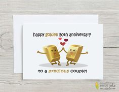 an anniversary card with two gold cubes holding hands and the words happy golden soth anniversary to a precious couple