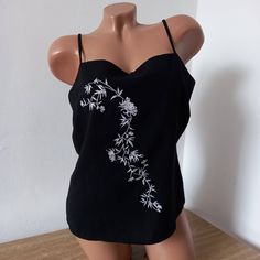 2000s Сrop tops for women     Vintage blouses Y2K  Top with straps with Embroidery Floral  Women blouse Retro Clothing Clothes Party  festival Boho Flowers M Polyester 100%    Color  Black white       Measurement: Bust 37 inches / 94cm Waist 33 inches / 84cm Length 21 inches / 53cm Summer Y2k V-neck Camisole, Y2k Style Camisole Top For Party, Summer Party Cotton Camisole, Casual Party Camisole Top, Y2k Cami Tops For Party, Y2k Style Cami Top For Party, Casual Camisole Top For Party, Floral Embroidery Spaghetti Strap Tops For Beach, Floral Embroidered Spaghetti Strap Tops For Beach