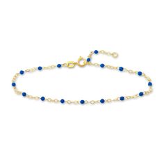 Distinctive blue enamel beads embellish shimmering links around the length of this stylish women's bracelet. Fashioned in 14K yellow gold, the 7.5-inch cable chain secures in place with a spring ring clasp. Dainty Blue Beaded Chain Bracelet, Blue 14k Gold Cable Chain Jewelry, Elegant Blue Bracelet With Delicate Chain, Elegant Blue Bracelets With Delicate Chain, Blue Beaded Chain Bracelets, Contoured Wedding Band, Jared The Galleria Of Jewelry, Enamel Beads, Bracelet Blue