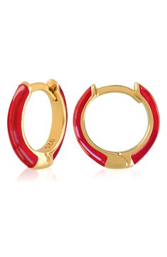 Easy-to-wear hoop earrings will add significant polish to even your most casual ensembles. 1/2" drop; 1/8" width Hinge with snap-post closure Sterling silver with goldtone plate/enamel Imported Small Hoop Enamel Earrings, Red Enamel Trendy Earrings, Trendy Red Enamel Earrings, Hoop Huggie Earrings In Enamel, Enamel Huggie Hoop Earrings For Pierced Ears, Red Huggie Earrings Gift, Red Small Hoop Earrings, Red Huggie Hoop Earrings As Gift, Red Huggie Earrings For Gift