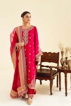 Rouge Transitional Pink Churidar With Sheer Dupatta, Red Raw Silk Churidar With Gota Work, Pink Kurta With Gota Work And Traditional Drape, Silk Churidar With Gota Work For Eid, Pink Traditional Churidar For Transitional Season, Transitional Pink Churidar With Traditional Drape, Pink Silk Traditional Wear With Gota Work, Pink Anarkali With Gota Work, Pink Anarkali With Gota Work Traditional Wear