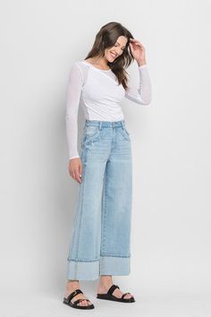 Say goodbye to boring jeans with the Ariana Jeans, perfect for those who love a baggy look! With a high rise fit and cuffed hem, these light wash jeans have a unique wide legdesign that will make you stand out. The side seam detail adds an extra touch of flair. The best part about our denim? They all have 1-3% spandex, a denim must! Details + Fit Rise 11" Inseam 33" 99% Cotton | 1% Spandex Runs True to Size Machine Wash Cold Line Dry High Rise Zipper Fly Side Seam Detail Cuffed Hem Non Distresse Trendy Wide-leg Cargo Jeans With Frayed Hem, Wide-leg Cotton Jeans With Frayed Hem, Pre-washed Wide Leg Relaxed Fit Jeans, Urban Wide-leg Jeans With Frayed Hem, Non-stretch High Rise Jeans With Frayed Hem, Ring Bag, Wide Jeans, Light Wash Jeans, Wide Leg Jeans