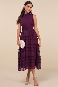 You'll always feel and look your best when you step out for the day in the Happily Sweet Purple Mock Neck Backless Midi Dress! Airy woven chiffon shapes this darling dress that features a sleeveless, lightly gathered bodice and a sophisticated mock neckline. A fitted, banded waist sits atop a breezy, A-line skirt that boasts tiers of ruffled accents as it falls to a chic midi hem. Long tying sashes secure above an open-back cutout for an ultra-alluring finish. Hidden side zipper/clasp. Fit: This garment fits true to size. Length: Mid-calf length. Size medium measures 50.5" from shoulder to hem. Bust: Great for any cup size. Waist: Fitted - very fitted at natural waist. Hip: Not Fitted - fuller skirt allows room for hips. Undergarments: May be worn with an adhesive bra, petals, or no bra. F Purple Knee Length Dress, Purple Cocktail Dress, Backless Midi Dress, Gathered Bodice, Purple Midi Dress, Mock Neck Dress, Dress Backless, Cocktail Wedding, Darling Dress