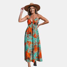 Unleash your vibrant spirit with our Tropical Floral Sleeveless Halter Maxi Dress. The playful tropical florals dance across the fabric, creating a lively and eye-catching ensemble. With a chic halter neckline and a flowing maxi length, this dress is a perfect balance of style and comfort. Product code: CAA05A4A038SJ/CAA05A4C090RK Multicolor Floral Sundress For Beach Season, Tropical Sleeveless Beach Dress For Beach Party, Sleeveless Tropical Beach Dress For Beach Party, Floral Print Beach Dress For Spring Holiday, Tropical Sleeveless Sundress For Beach Party, Tropical Floral Print Vacation Dresses, Sleeveless Tropical Beach Dress, Tropical Sleeveless Maxi Dress For Summer Parties, Sleeveless Tropical Maxi Dress For Summer Parties