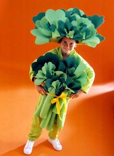 a person in a costume made to look like broccoli