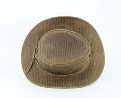 Our weaved leather cowboy hats are made of genuine cowhide leather. This beautifully handcrafted hat is made with fine craftsmanship and materials. Any scars, wrinkles or other subtle variations are characteristics of natural leather and do not affect its strength or quality. The unisex leather hat is embellished with brass conchos. The crown of the had also boasts a braided hat band. Use the strap for windy days or to keep it around your neck while traveling so you won't lose it. Perfect access Western Brown Straw Hat For Outdoors, Western Style Brown Straw Hat For Outdoor, Brown Western Straw Hat For Outdoor, Brown Western Style Straw Hat For Outdoor, Brown Western Style Outdoor Straw Hat, Western Braided Hat Bands For Rodeo, Braided Western Hat Bands For Rodeo, Western Braided Hat Band For Ranch, Distressed Brown Country Hat For Rodeo