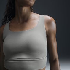 Find your bliss in this medium-support bra. A sewn-in 1-piece pad and longline silhouette offer enhanced coverage and shaping while sweat-wicking technology keeps you cool and comfortable. The fabric in the body and straps is lightweight, with softness that you can feel with every bend, stretch and shift. You might just forget you're wearing a bra at all. Nike Yoga Sports Bra With Built-in Bra, Nike Sports Bra With Built-in Bra For Yoga, Nike Activewear With Built-in Bra For Workout, Nike Yoga Top With Built-in Bra, Versatile Nike Activewear For Workout, Nike Activewear For Workout, Bra Friendly, Nike Bra Friendly Activewear For Workout, Nike Seamless Activewear For Workout, Nike Compressive Sports Bra For Workout