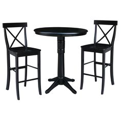 a small table and two chairs with one chair up against the other, both in black