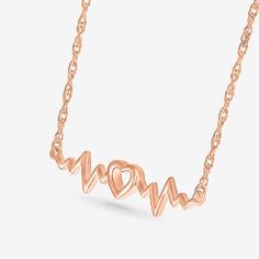 Jewelry Closure: Spring Ring ClaspLink Construction: SolidShape: HeartMetal Color: RoseChain Length: 18 InchChain Width: .6 MillimetersPendant Length: 6.2mmPendant Width: 26mmChain Construction: RopeCare: Wipe CleanMetal: 10k Rose GoldNecklace Type: Pendant NecklacesCountry of Origin: Imported Rose Gold Clavicle Chain For Valentine's Day, Elegant Rose Gold Heart Necklace, Rose Gold Double Heart Jewelry With Adjustable Chain, Rose Gold Double Heart Clavicle Chain, Rose Gold Heart Jewelry For Valentine's Day, Valentine's Day Rose Gold Metal Jewelry, Rose Gold Heart Pendant Jewelry For Valentine's Day, Rose Gold Double Heart Jewelry For Valentine's Day, Rose Gold Metal Necklaces For Anniversary