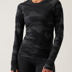 Brand New With Tags. Nylon/Poly/Spandex. Black Seamless Activewear With Athletic Fit, Black Snug Fit Athleisure Top, Black Seamless Functional Activewear, Functional Seamless Black Tops, Black Snug Fit Sporty Top, Black Gym Top With Thumbholes, Seamless Snug Fit Sports Tops, Sporty Snug Fit Black Top, Functional Black Top With Seamless Design