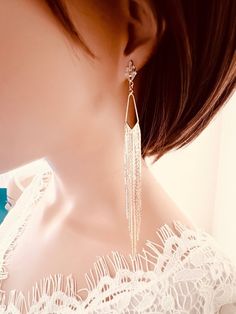 Gold Tassel Earrings For Wedding, Elegant Long Drop Tassel Earrings, Elegant Long Drop Tassel Earrings For Gift, Wedding Threader Earrings With Adjustable Chain, Wedding Adjustable Chain Threader Earrings, Elegant Party Jewelry With Dangling Charms, Metal Tassel Earrings For Wedding, Elegant Tassel Dangle Earrings For Pierced Ears, Elegant Dangle Tassel Earrings For Pierced Ears