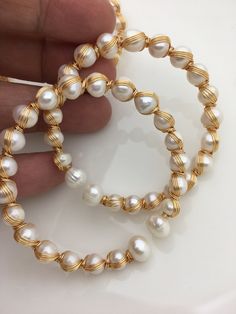 quantity: 1 pc pearl jewelry: pearl bangle length: 7 inches pearl grade: AA+ pearl luster: high pearl shape: potato pearl size: around 7mm pearl color: white macth necklace: https://www.etsy.com/listing/734498829/17-aaa-65-7mm-misc-color-button-round?ref=listings_manager_grid match earrings: https://www.etsy.com/listing/201118982/3-dollars-promote-for-opening-gray-pearl?ref=shop_home_active_13&ga_search_query=grey match bracelet: can use this grey pearl make to bracelet, 6USD Back to Other Jewel Leather Pearl Jewelry, Handmade Bangle Bracelets, Pearl Bangle, Big Pearl, Jewelry Pearl, Handmade Bangles, Pearl Leather, Keshi Pearls, Sea Pearls