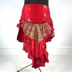 Luna Steampunk Over Skirt, Bustle skirt, tribal mini skirt, fashioned from vintage silk brocade.  This tail skirt is a great addition to all sorts of outfits.  Easily add an extra, colourful layer over leggings, tights, skirts or shorts. Wear at the back or side. The skirt is adjustable in fitting. It has 2 silk ties which are attached to two strong brass hoops for added style and functionality. Strong stitching, pleating and layers of ruched fabric on the tail makes this an eternally stunning p Gothic Asymmetrical Skirt For Festivals, Gothic Mini Skirt For Festival, Gothic Ruffled Skirt For Festival, Fitted Tiered Skirt For Cosplay, Festival Dance Skirt, Fitted, Red Tiered Skirt For Dance, Fitted Skirt For Dance Festivals, Fitted Festival Skirt For Dance, Festival Fitted Skirt For Dance