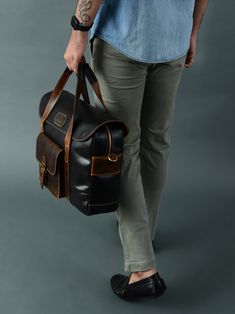 This Walker Office Top Handle bag is crafted with full-grain buffalo leather for a sophisticated, yet sturdy look. The adjustable strap ensures maximum comfort and convenience. Perfect for business professionals, it can fit laptops and documents plus all other essential office supplies. The Prestige Briefcase stands out from the competition with its unique colors and textures. Combining style with durability, this briefcase is the perfect choice for anyone looking for a distinctive yet reliable Business Travel Bag With Leather Lining, Satchel Shape, Classic Office Travel Bag With Leather Handles, Functional Brown Leather Laptop Bag, Leather Laptop Shoulder Bag For Business Trips, Leather Business Travel Bag With Luggage Sleeve, Leather Satchel Travel Bag For Business Trips, Leather Satchel For Business Trips, Leather Shoulder Satchel For Business Trips, Leather Shoulder Bag Satchel For Business Trips