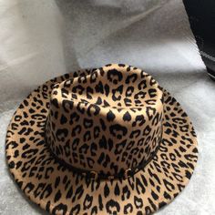 Animal Print Fedora Hat Chic Brown Winter Hats, Chic Brown Felt Hat For Winter, Chic Brown Felt Hat For Beach, Chic Brown Felt Hat For The Beach, Winter Vacation Brimmed Fedora, Chic Brown Hat For Fall, Chic Brown Fall Hat, Brown Brimmed Felt Hat For Vacation, Brown Felt Hat For Vacation