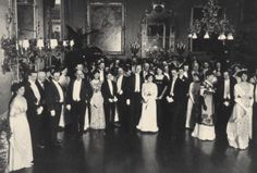 a large group of people in formal attire