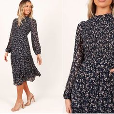 Midi Length Dress With A Round Ruffle Neckline, Long Sleeves With Elasticized Cuff, Shirred Bodice, Back Neck Opening With Button Close Ruffle Detailing, Small Floral Print, Partially Lined Material - 100% Polyester / Lining 100% Rayon Tags Are Still On! Elegant Long Sleeve Midi Dress With Ditsy Floral Print, Elegant Long Sleeve Maxi Dress With Ditsy Floral Print, Elegant Fitted Midi Dress With Ditsy Floral Print, Elegant Midi Dress With Ditsy Floral Print, Elegant Casual Midi Dress With Ditsy Floral Print, Small Floral Print, Navy Midi Dress, Sleeve Midi Dress, Long Sleeve Midi