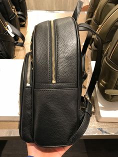 Michael Kors Women's Abbey Medium Studded Leather Backpack Black 35T8GAYB2L Pebbled leather with studded accent 100% polyester lining Gold tone hardware Zip closure Exterior features 1 zip pocket in front and 2 slide pockets on side Interior features 1 zip pocket, 1 large slip pocket and 2 multi-function slip pockets 23cm (W) x 30cm (H) x 11cm (D) Michael Kors Backpack For On-the-go, Leather Backpack With Gold-tone Hardware For On-the-go, Leather Bags With Metal Zipper For Daily Use, Luxury Leather Backpack With Zipper For Daily Use, Designer Backpack With Zipper For On-the-go, Luxury Leather Backpack For Travel With Zipper Closure, Designer Leather School Bag, Luxury Backpack With Zipper Closure, Leather Satchel Backpack With Gold-tone Hardware