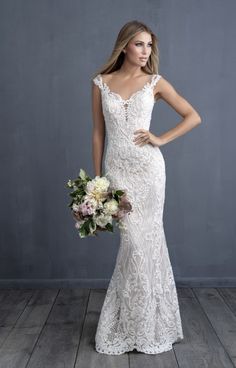 a woman in a wedding dress holding a bouquet