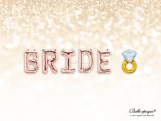 the word bride spelled with balloons in front of a gold glitter background and diamond ring