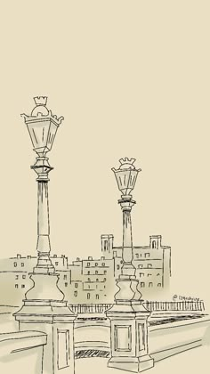 a black and white drawing of two street lamps in front of a cityscape