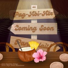 a wooden sign that says pag - abi - abi coming soon next to a coconut drink