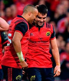 two rugby players are congratulating each other