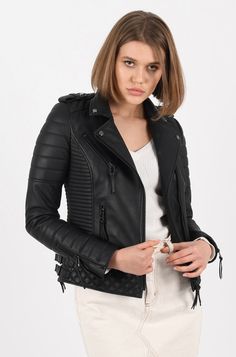 Tight fit biker style leather jacket. Double front fastening zips. Quilted detail & side buckles. Genuine Black Leather Womans Jacket 100% Lambskin Black metal zips/hardware Tight fit Quilted detail Tailored Lapels 2 Outside zipped pockets plus inside pocket which fits an iphone (zipped) Premium Lined Chic/Modern Can be worn anywhere (PLEASE CHECK OUR SIZING GUIDE BEFORE ORDERING) Long Sleeve Leather Jacket For Biker Events, Fitted Moto Leather Jacket With Asymmetrical Zip, Fall Biker Leather Jacket With Ykk Zipper, Punk Leather Biker Jacket With Zipper, Punk Leather Jacket With Zipper Closure, Long Sleeve Biker Jacket With Zipper For Biker Events, Leather Biker Jacket With Ykk Zipper, Leather Jacket For Biker Events With Ykk Zipper, Edgy Leather Biker Jacket With Asymmetrical Zip