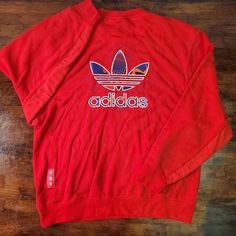 Adidas Sweater Red Sz Large Red Vintage Red Sweatshirt For Streetwear, Red Cotton Sweatshirt With Graphic Print, Casual Red Graphic Print Sweatshirt, Red Cotton Graphic Print Sweatshirt, Adidas Red Winter Tops, Red Adidas Tops For Winter, Retro Red Sweatshirt For Streetwear, Retro Red Cotton Sweatshirt, Retro Red Long Sleeve Sweatshirt