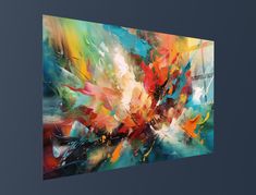 an abstract painting with many colors and shapes on the canvas, it appears to be colorful