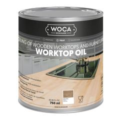 a can of wood workstop oil on a white background