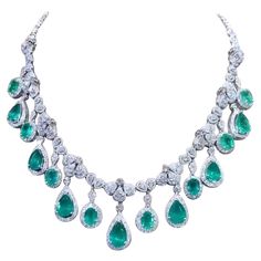 A magnificent piece of Italian art , a very fabulous design, sophisticated and refined, a glamour and fashion collection, perfect for elegant ladies. Necklace come in 18k gold with 7 pieces of natural Zambian Emeralds in pear cut of 20,75 carats , fine quality, amazing color, CEO Minor, and 8 pieces of natural Zambian Emeralds in oval cut of 15,44 carats, fine quality, spectacular color , CEO Minor , and 763 pieces of natural diamonds in special cut of 20,55 carats, F color VS clarity, very sparkly . Piece of high jewelry. Handcrafted by artisan goldsmith. Excellent manufacture and quality. Complete with AIG certificate. Whosale price. Note: on my shipment, no taxes. Ladies Necklace, 18k Gold Necklace, Elegant Ladies, Zambian Emerald, Italian Art, Gorgeous Jewelry, Zambia, Dream Jewelry, High Jewelry